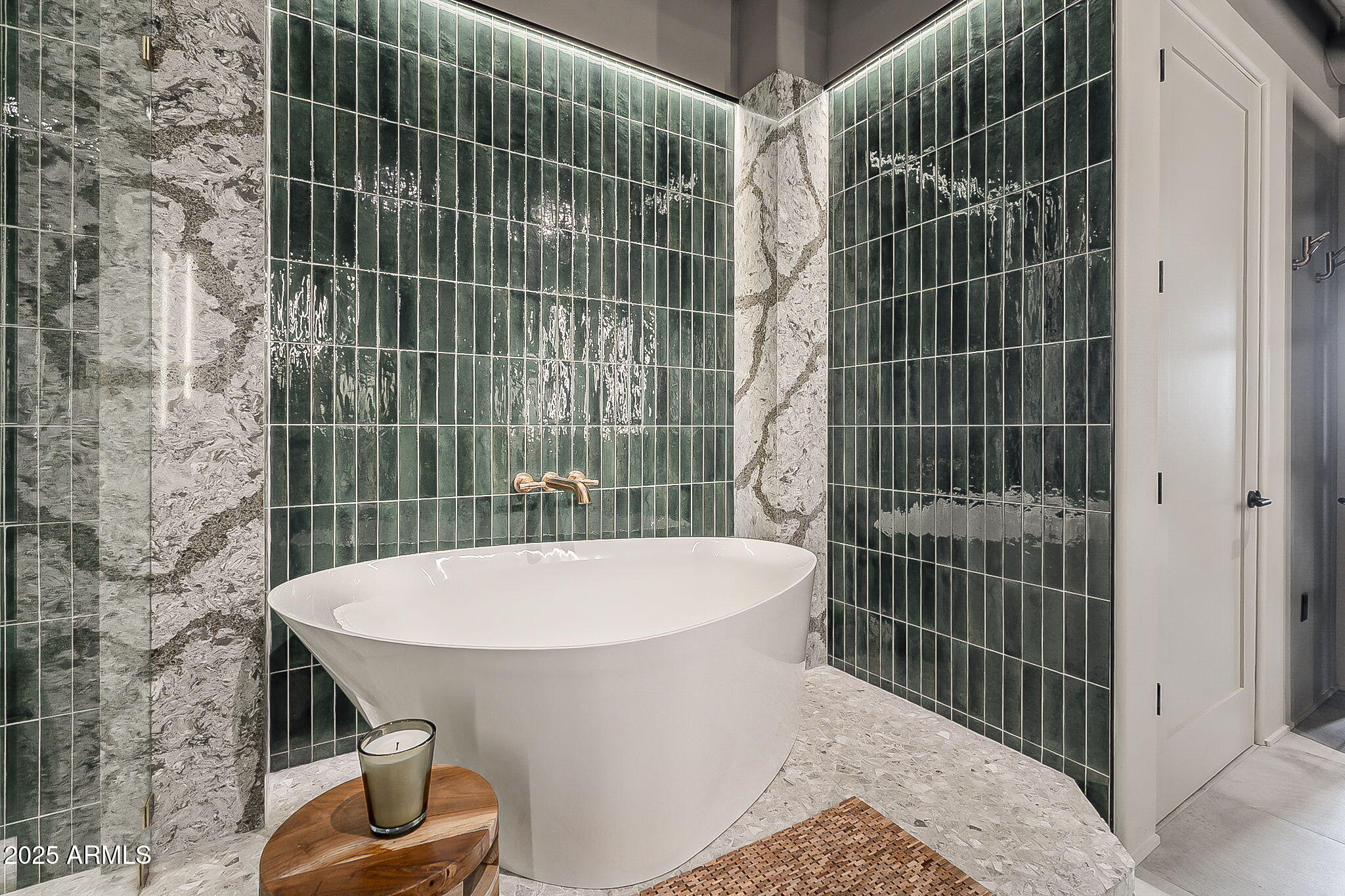 2211 East Camelback Road, Unit 605 Phoenix, AZ 85016 - Photo 39 of 56 a bathroom with a bathtub and a shower