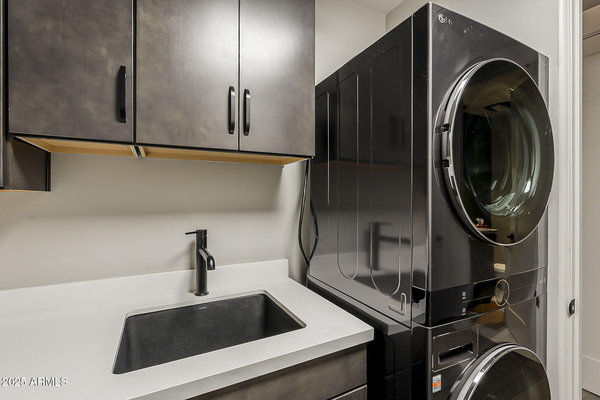 2211 East Camelback Road, Unit 605 Phoenix, AZ 85016 - Photo 48 of 56 a close view of sink and tap