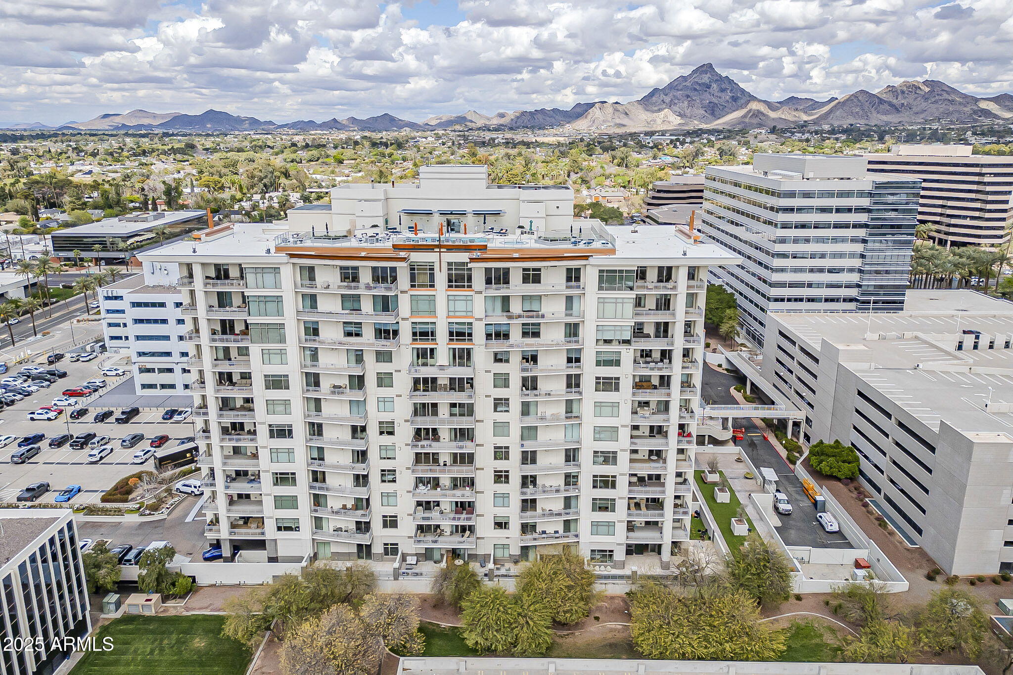 2211 East Camelback Road, Unit 605 Phoenix, AZ 85016 - Photo 9 of 56 a view of a city with tall buildings