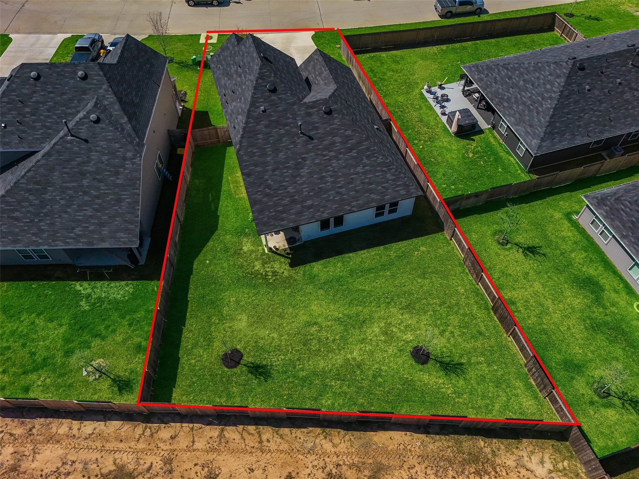 815 Devils Bridge Street Conroe, TX 77303 - Photo 23 of 25 a view of a backyard