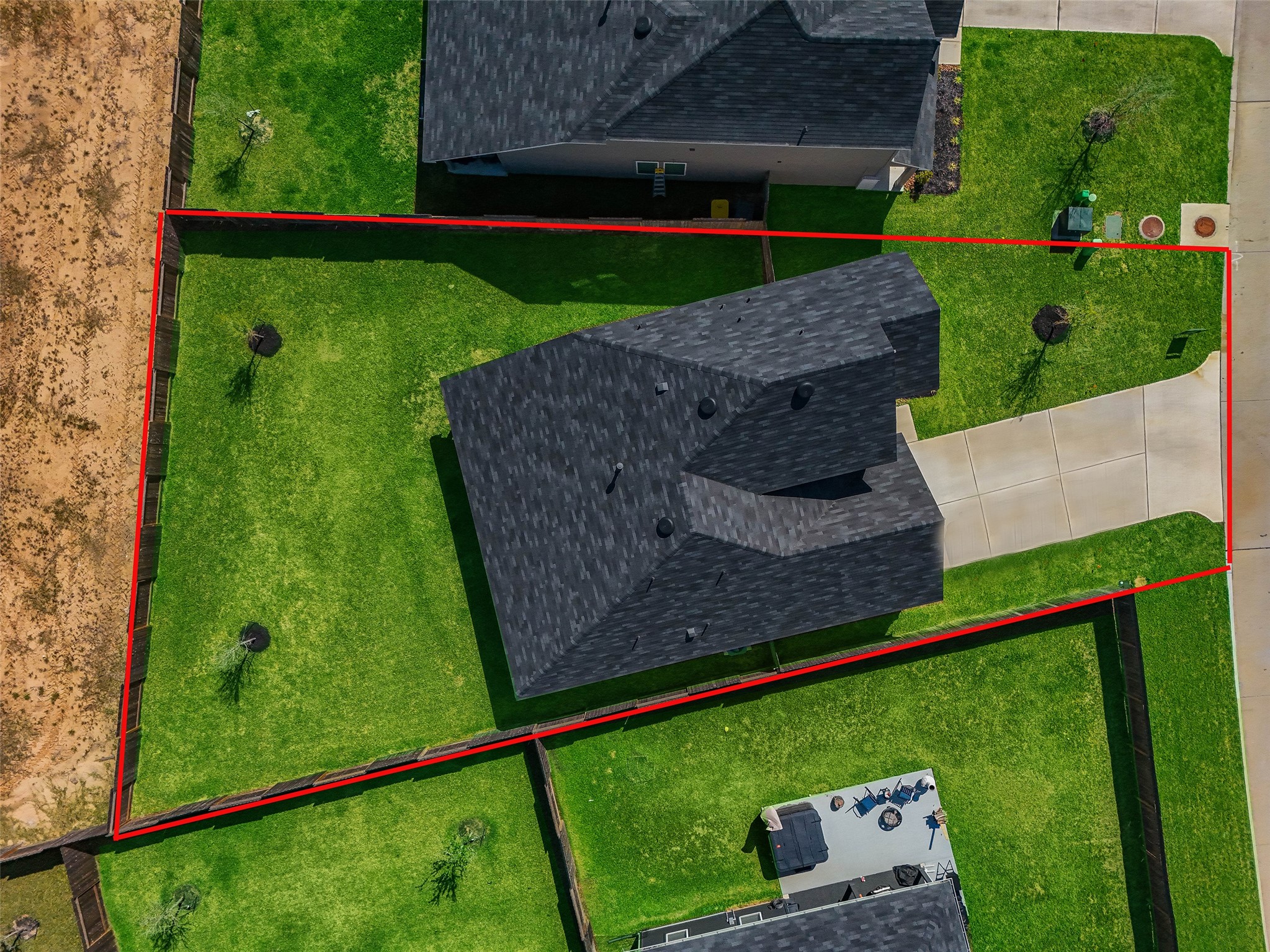 815 Devils Bridge Street Conroe, TX 77303 - Photo 25 of 25 a view of a backyard with sitting area