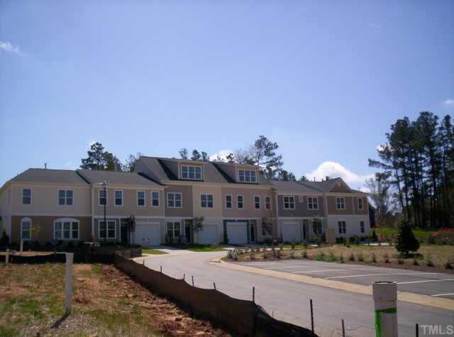 145 Deacon Ridge Street Wake Forest, NC 27587 - Photo 2 of 9 a front view of a building with street view