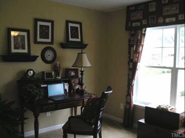 145 Deacon Ridge Street Wake Forest, NC 27587 - Photo 9 of 9 a view of workspace with a window