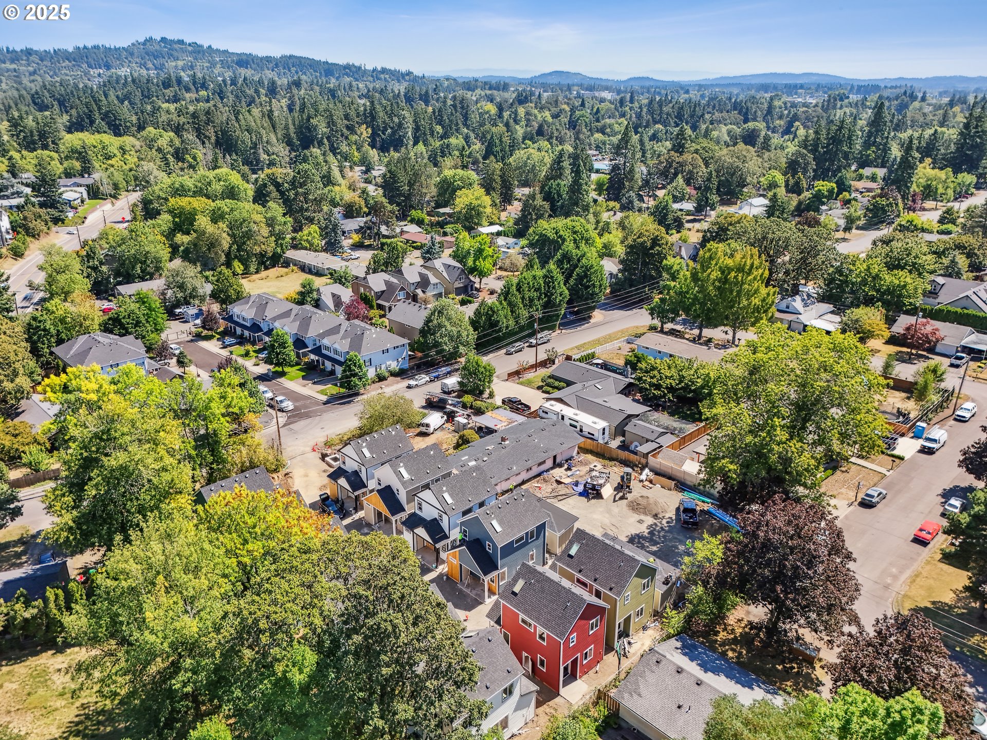 9552 Southwest 91st Avenue, Unit 1 Portland, OR 97223 - Photo 18 of 25 an aerial view of residential houses with outdoor space