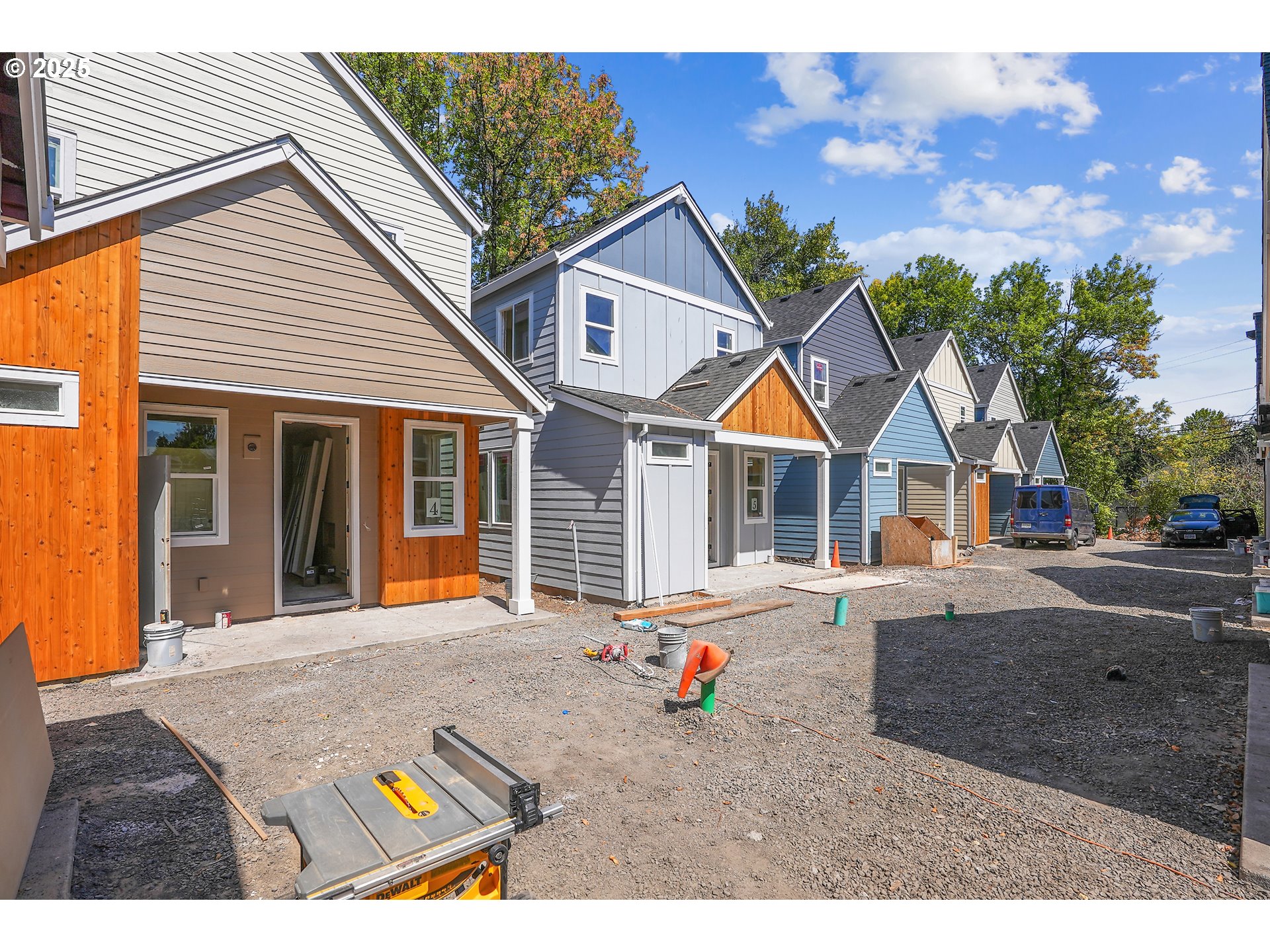 9552 Southwest 91st Avenue, Unit 1 Portland, OR 97223 - Photo 2 of 25 a backyard of a house with seating space