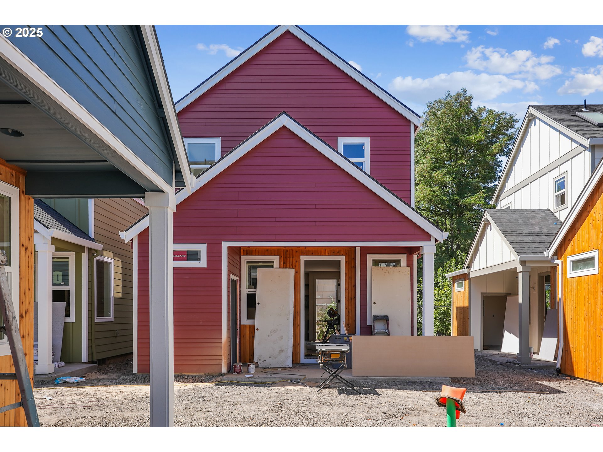 9552 Southwest 91st Avenue, Unit 1 Portland, OR 97223 - Photo 10 of 25 a front view of a house with a yard