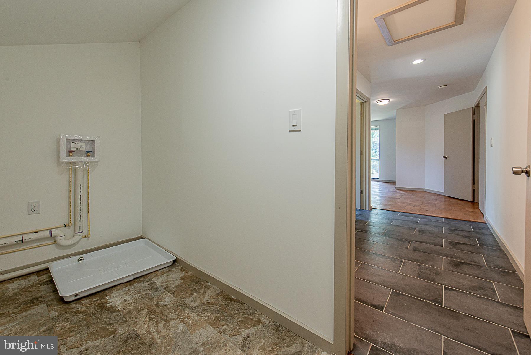 5301 Lightning View Road Columbia, MD 21045 - Photo 33 of 47 Laundry room with storage off master bedroom