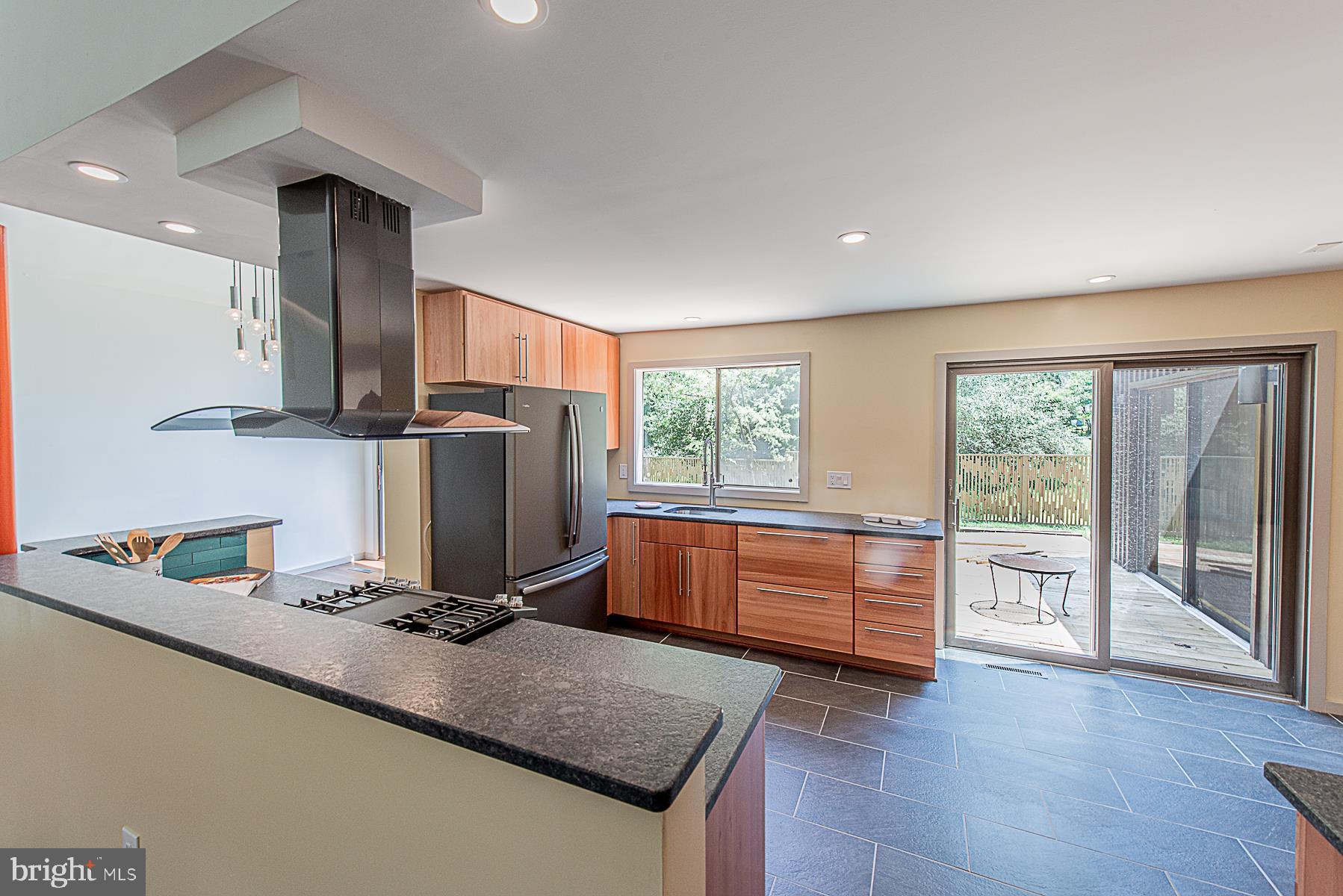 5301 Lightning View Road Columbia, MD 21045 - Photo 9 of 47 Beautiful slate tile floor plus 3rd slider to deck