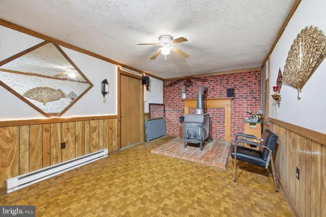 a view of a livingroom with furniture and chandelier