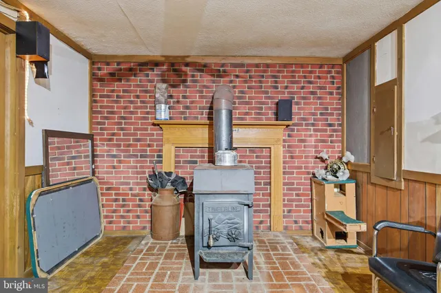 a kitchen with a sink appliances and cabinets