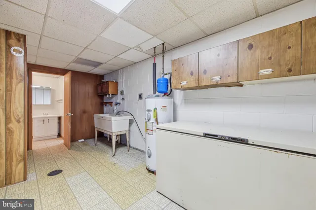 a utility room with cabinets