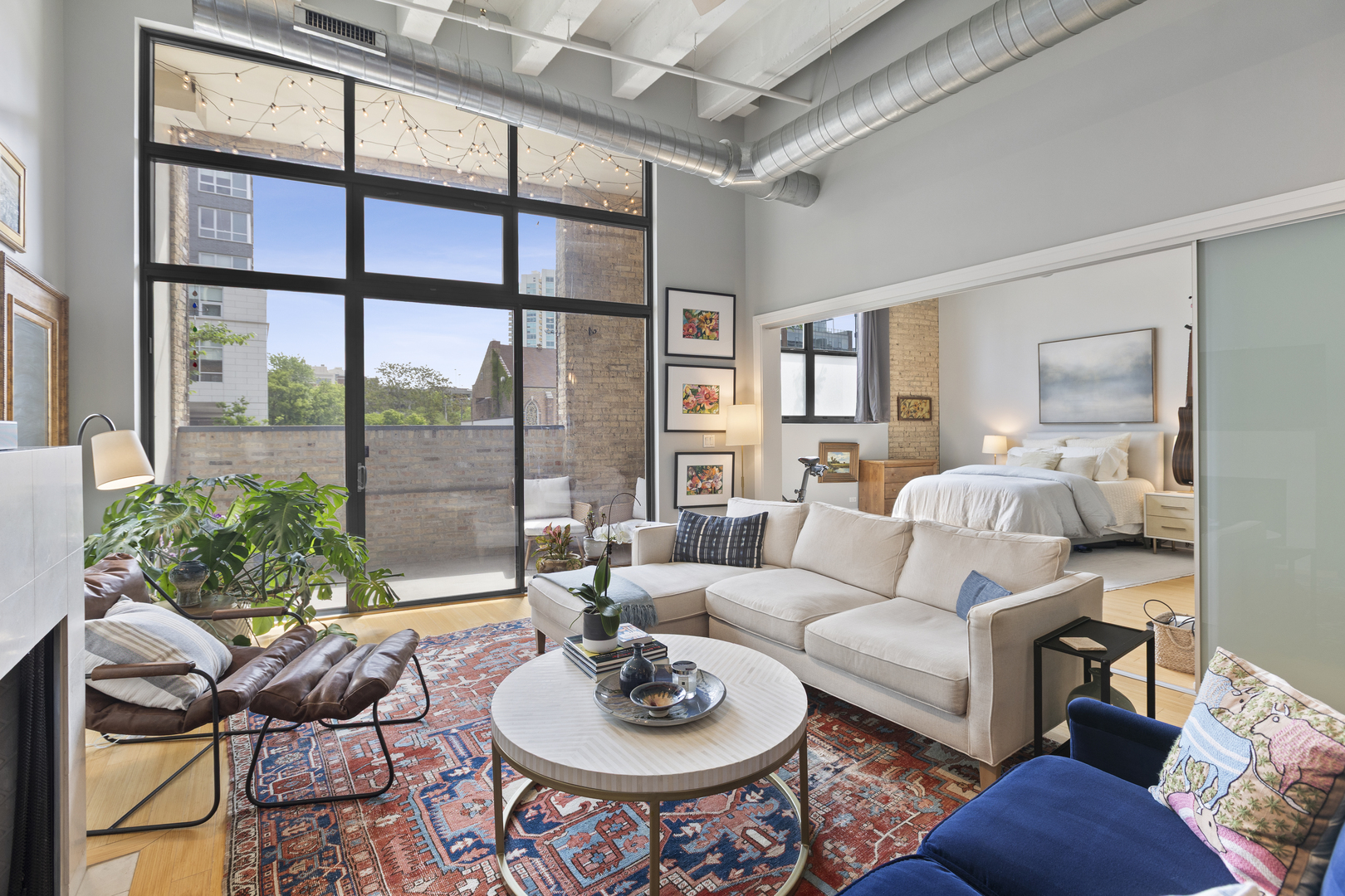 1800 Ridge Avenue, Unit 102 Evanston, IL 60201 - Photo 10 of 26 a living room with furniture and a large window