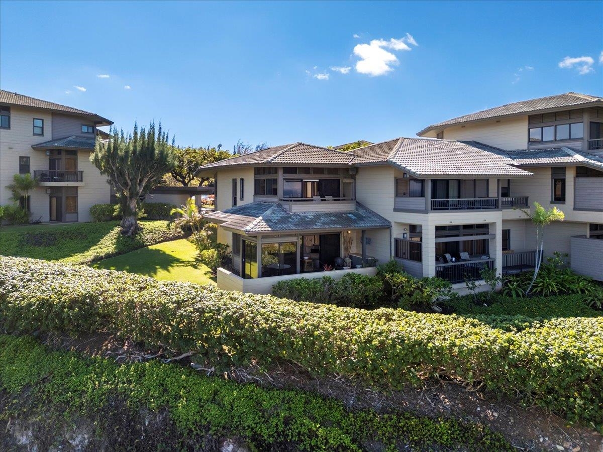 100 Ridge Road, Unit 2915 Lahaina, HI 96761 - Photo 43 of 43 a view of a house with a big yard and large trees