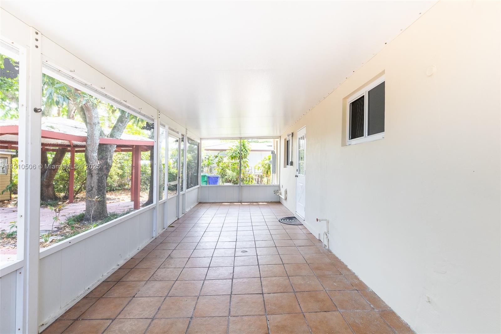 6440 Southwest 20th Street Miramar, FL 33023 - Photo 14 of 31 a view of a hallway with windows