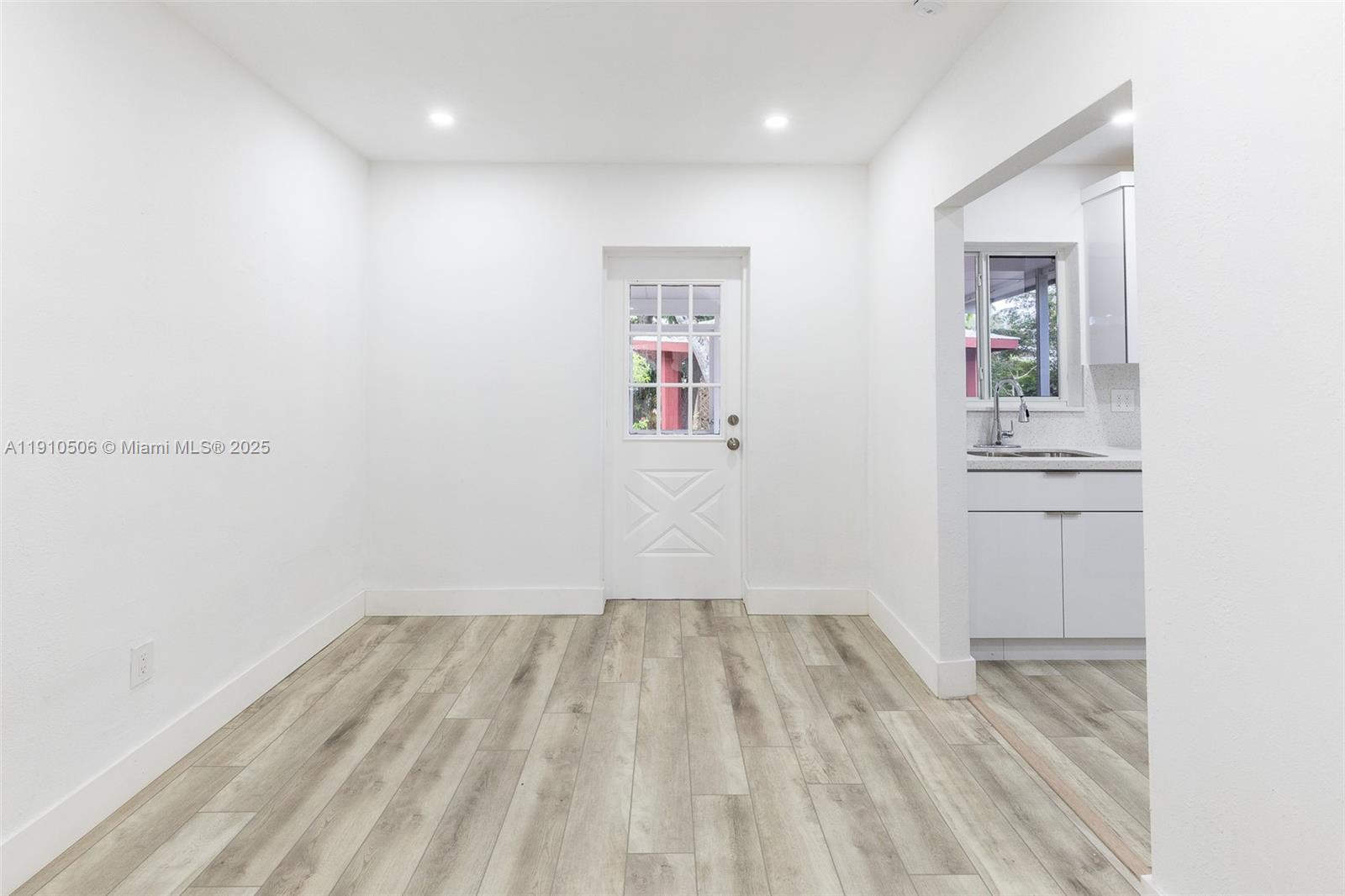 6440 Southwest 20th Street Miramar, FL 33023 - Photo 20 of 31 a view of kitchen with wooden floor