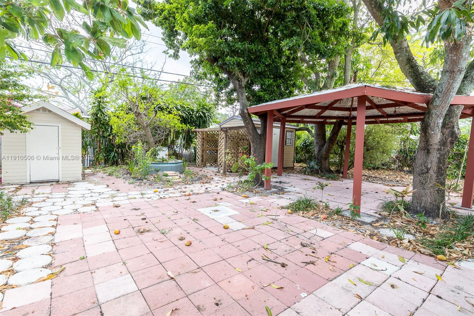 6440 Southwest 20th Street Miramar, FL 33023 - Photo 25 of 31 a front view of a house with garden