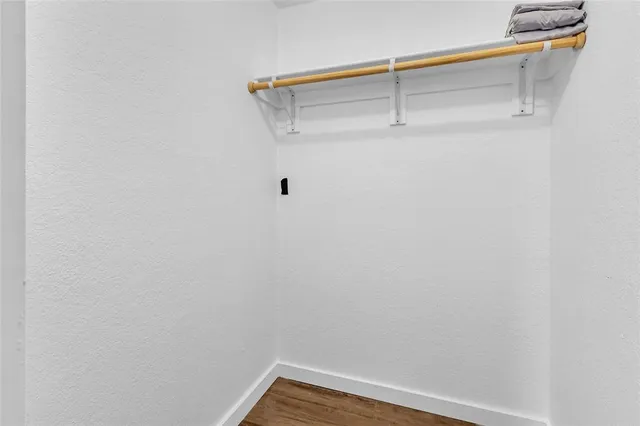 a view of a room with racks on the wall