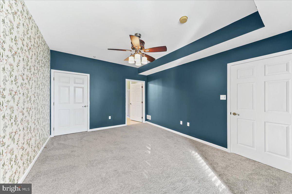 1588 Nicklaus Drive Springfield, PA 19064 - Photo 14 of 25 a view of a livingroom with a chandelier fan