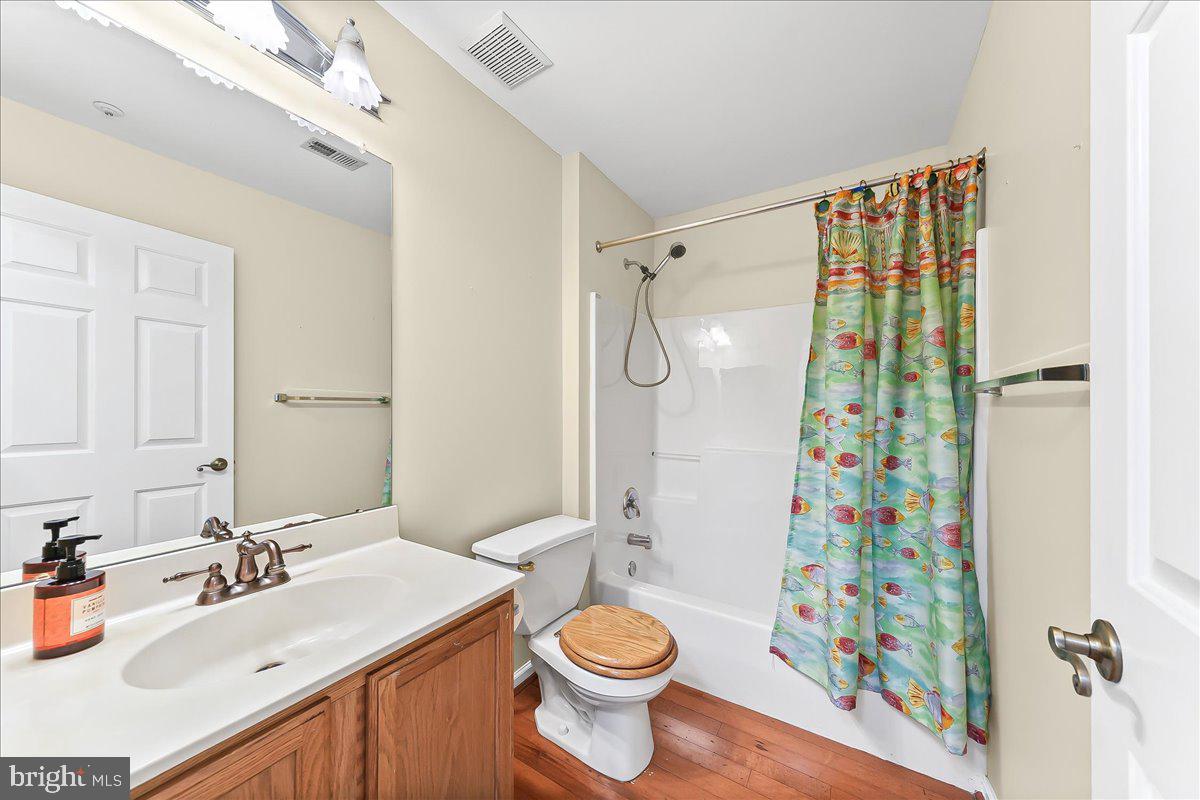 1588 Nicklaus Drive Springfield, PA 19064 - Photo 19 of 25 a bathroom with a sink toilet and shower