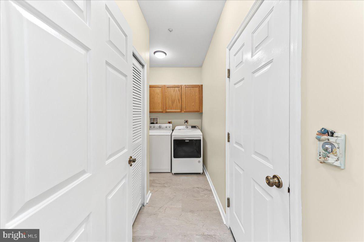 1588 Nicklaus Drive Springfield, PA 19064 - Photo 22 of 25 a bathroom with a sink and a mirror
