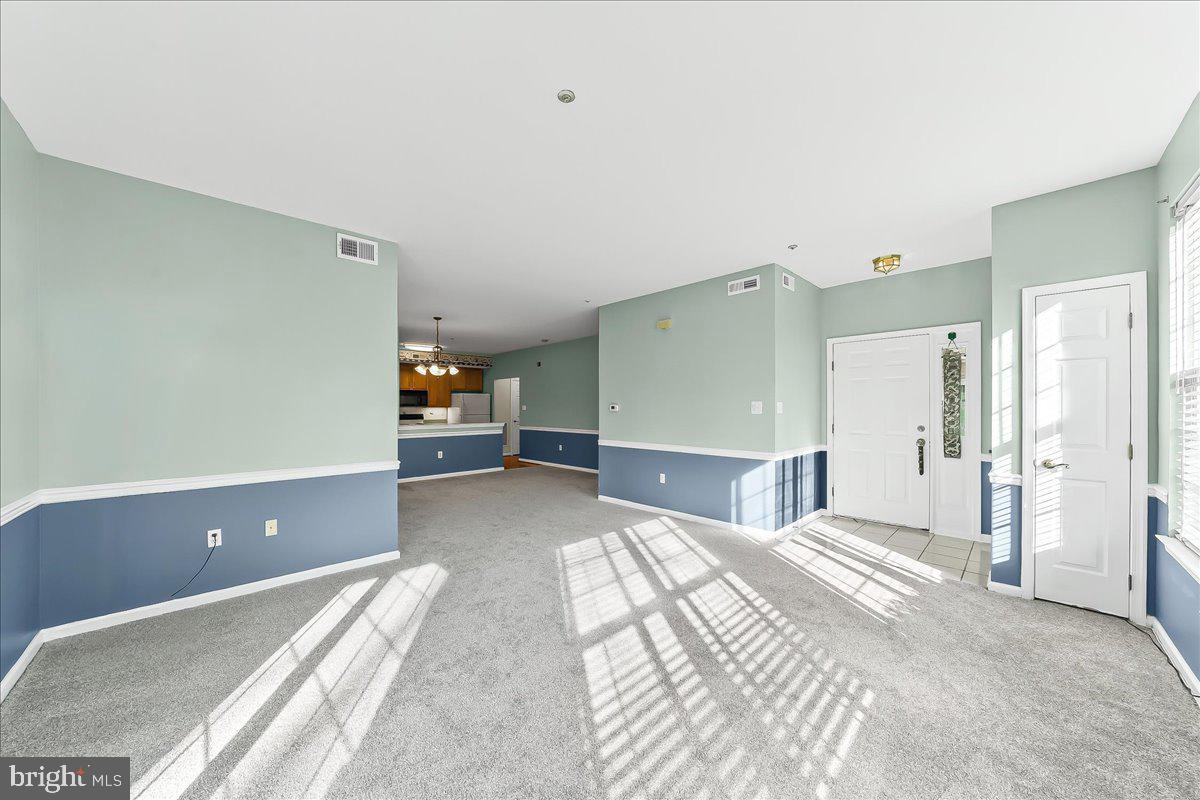 1588 Nicklaus Drive Springfield, PA 19064 - Photo 5 of 25 a bedroom with a bed and cabinets