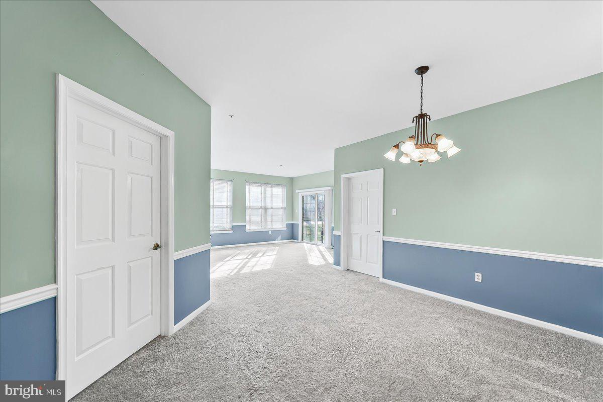 1588 Nicklaus Drive Springfield, PA 19064 - Photo 9 of 25 a view of empty room with windows