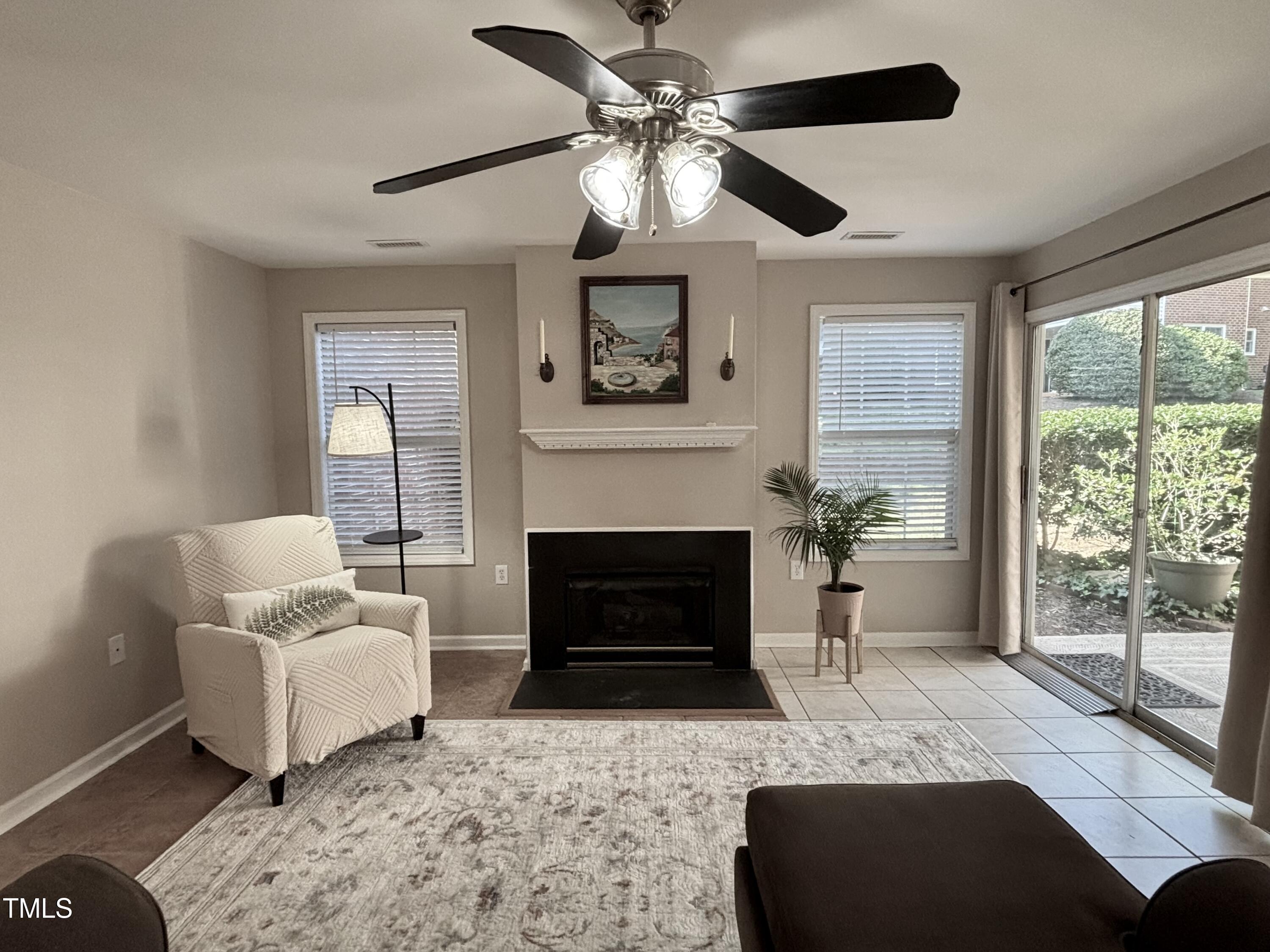 1613 Bulon Drive Cary, NC 27518 - Photo 2 of 26 a living room with furniture and a fireplace