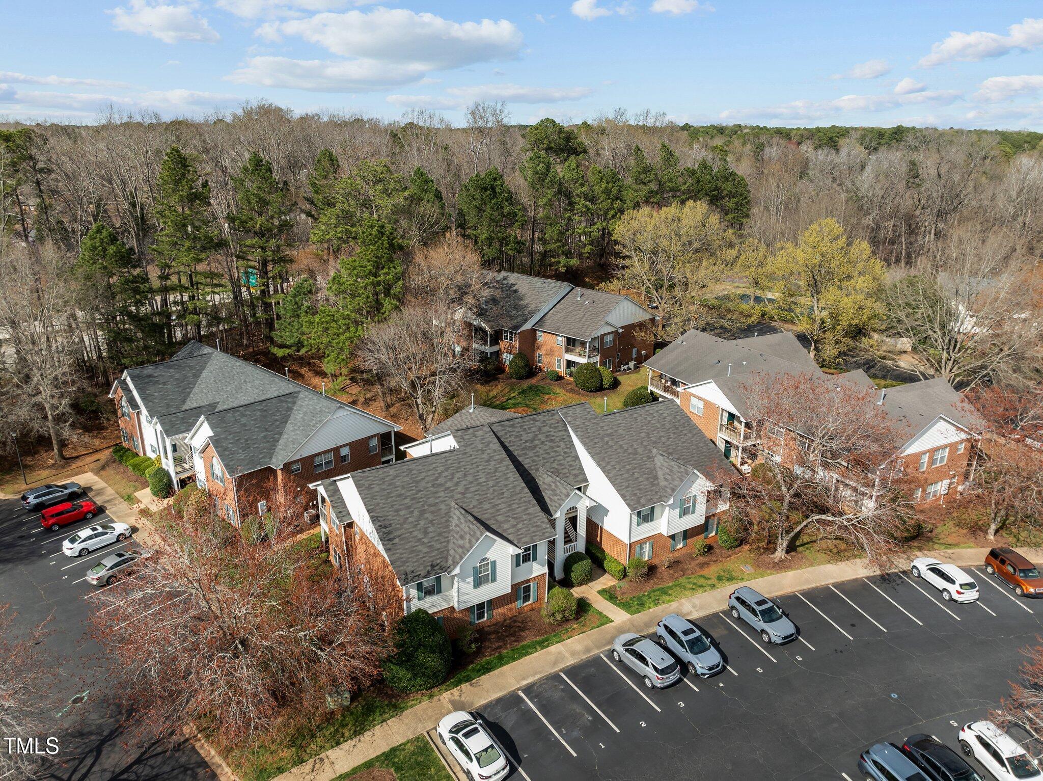 1613 Bulon Drive Cary, NC 27518 - Photo 22 of 26 an aerial view of a city with lots of residential buildings