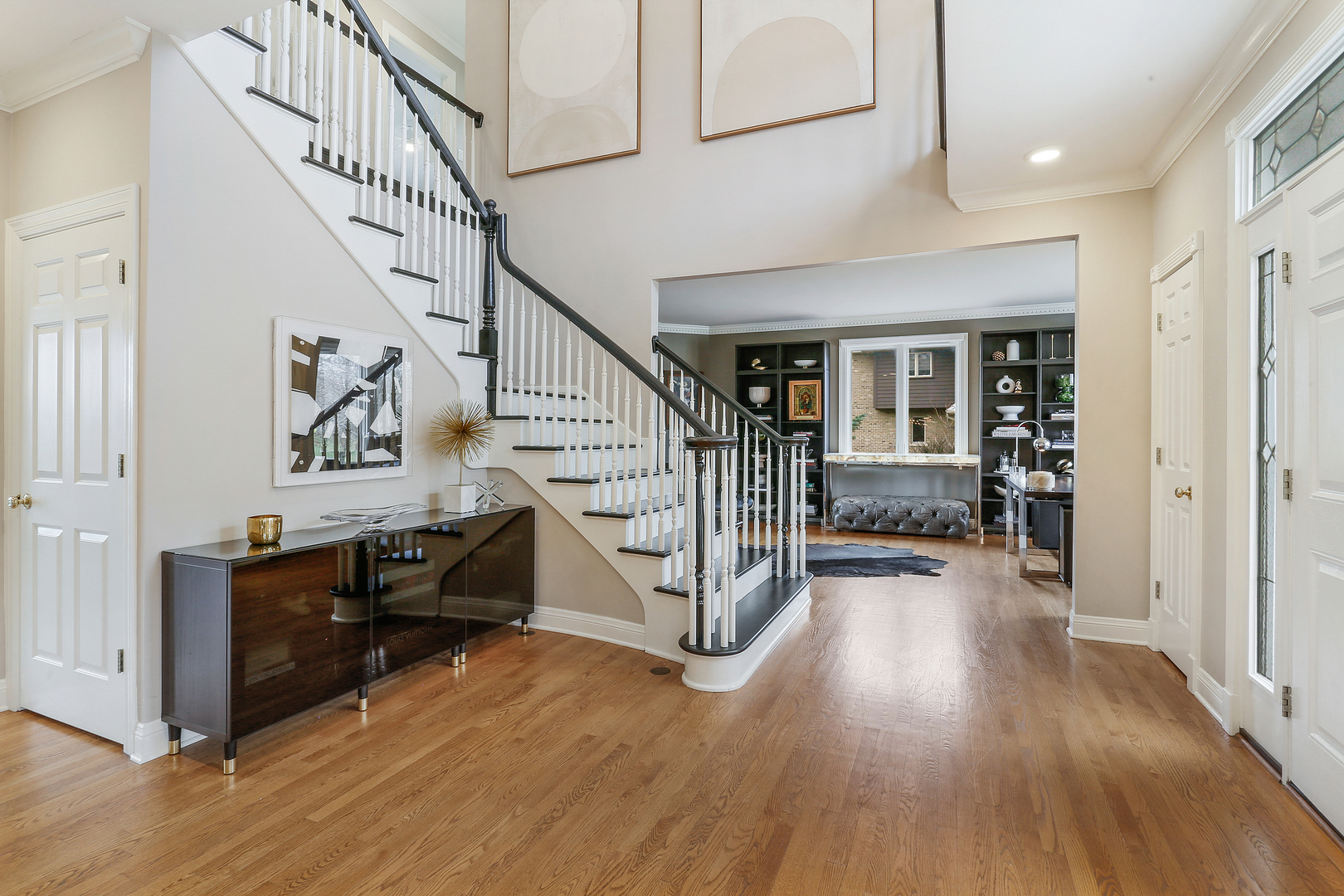 65 Ruffled Feathers Drive Lemont, IL 60439 - Photo 12 of 44 a view of entryway livingroom and hall with wooden floor