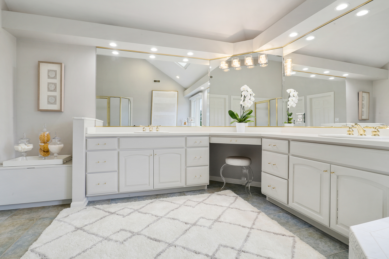 65 Ruffled Feathers Drive Lemont, IL 60439 - Photo 29 of 44 a spacious bathroom with a double vanity sink and a mirror