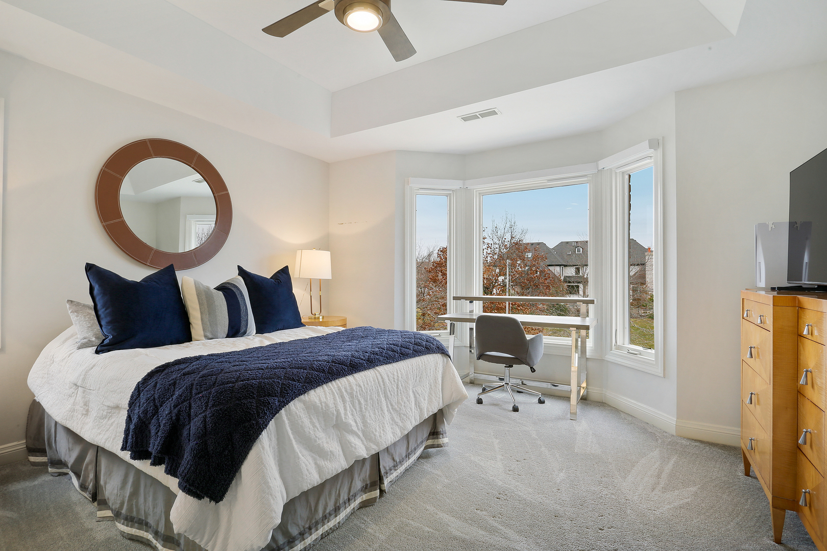 65 Ruffled Feathers Drive Lemont, IL 60439 - Photo 31 of 44 a bedroom with bed and a large window