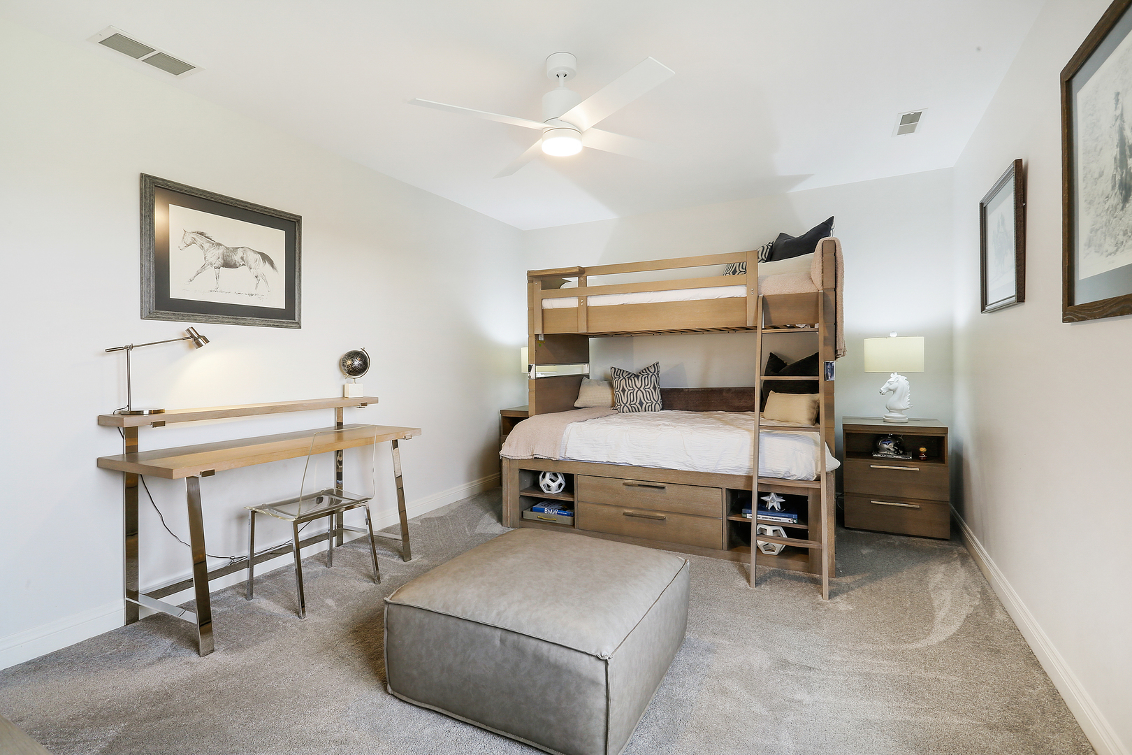 65 Ruffled Feathers Drive Lemont, IL 60439 - Photo 33 of 44 a bedroom with a bed and a table in it