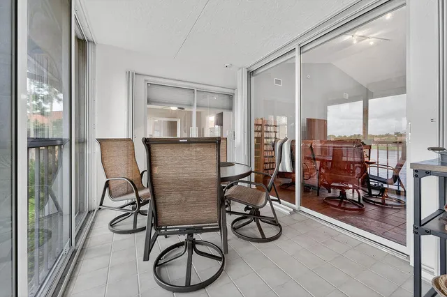 a spacious bedroom with a bed and a couch