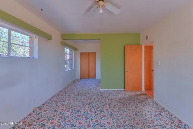 a bathroom with a bathtub sink and a mirror