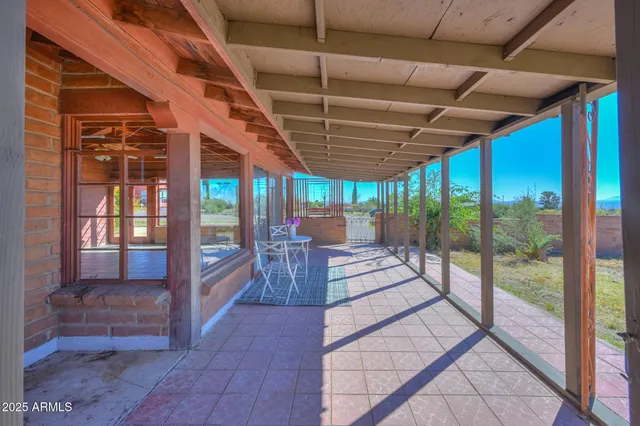 a building outdoor space with balcony and living room view
