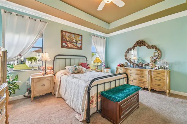 a bathroom with a sink vanity and a mirror
