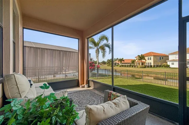a view of an house with backyard and swimming pool