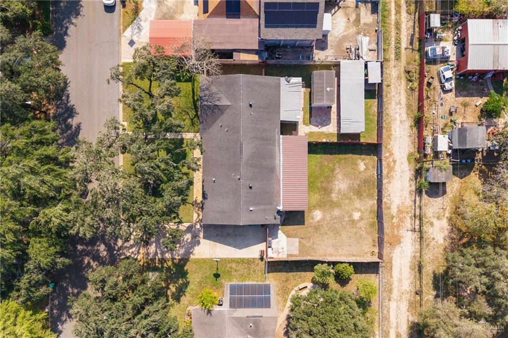 1222 South Bluebonnet Street Pharr, TX 78577 - Photo 14 of 17 an aerial view of residential houses with outdoor space