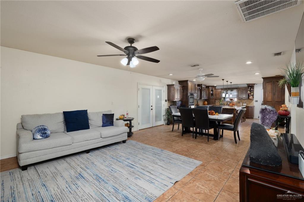 1222 South Bluebonnet Street Pharr, TX 78577 - Photo 4 of 17 a living room with furniture and wooden floor