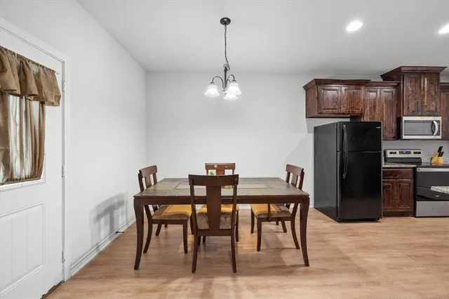 a view of a dining room with furniture