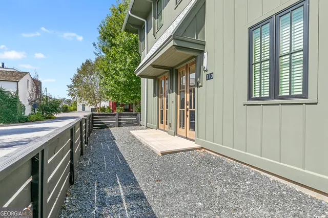 a narrow alley leading to a building