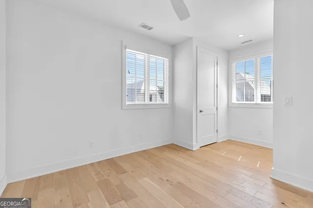 an empty room with windows