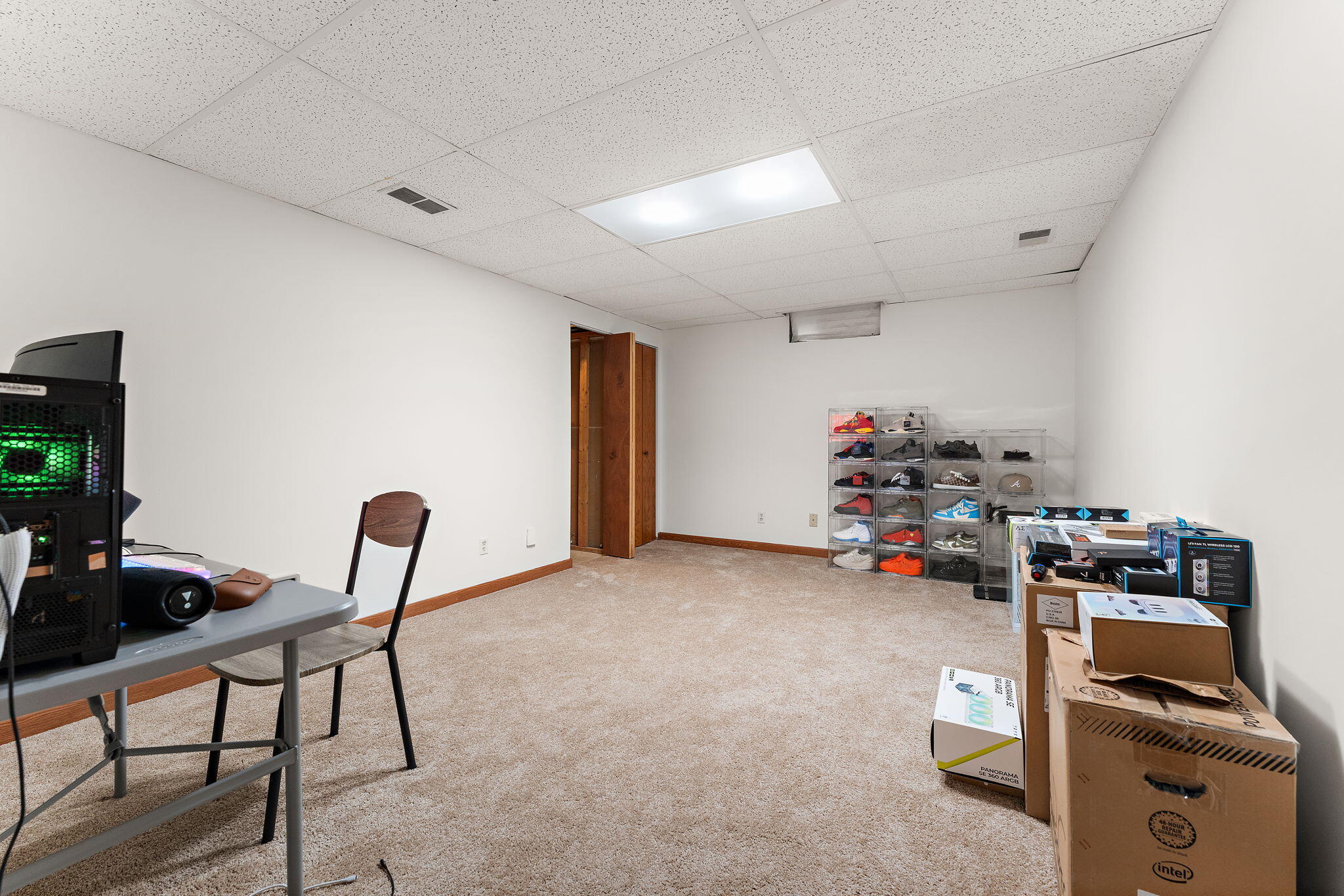 602 Brunswick Court Valparaiso, IN 46383 - Photo 25 of 34 a view of a workspace with furniture and gym equipment