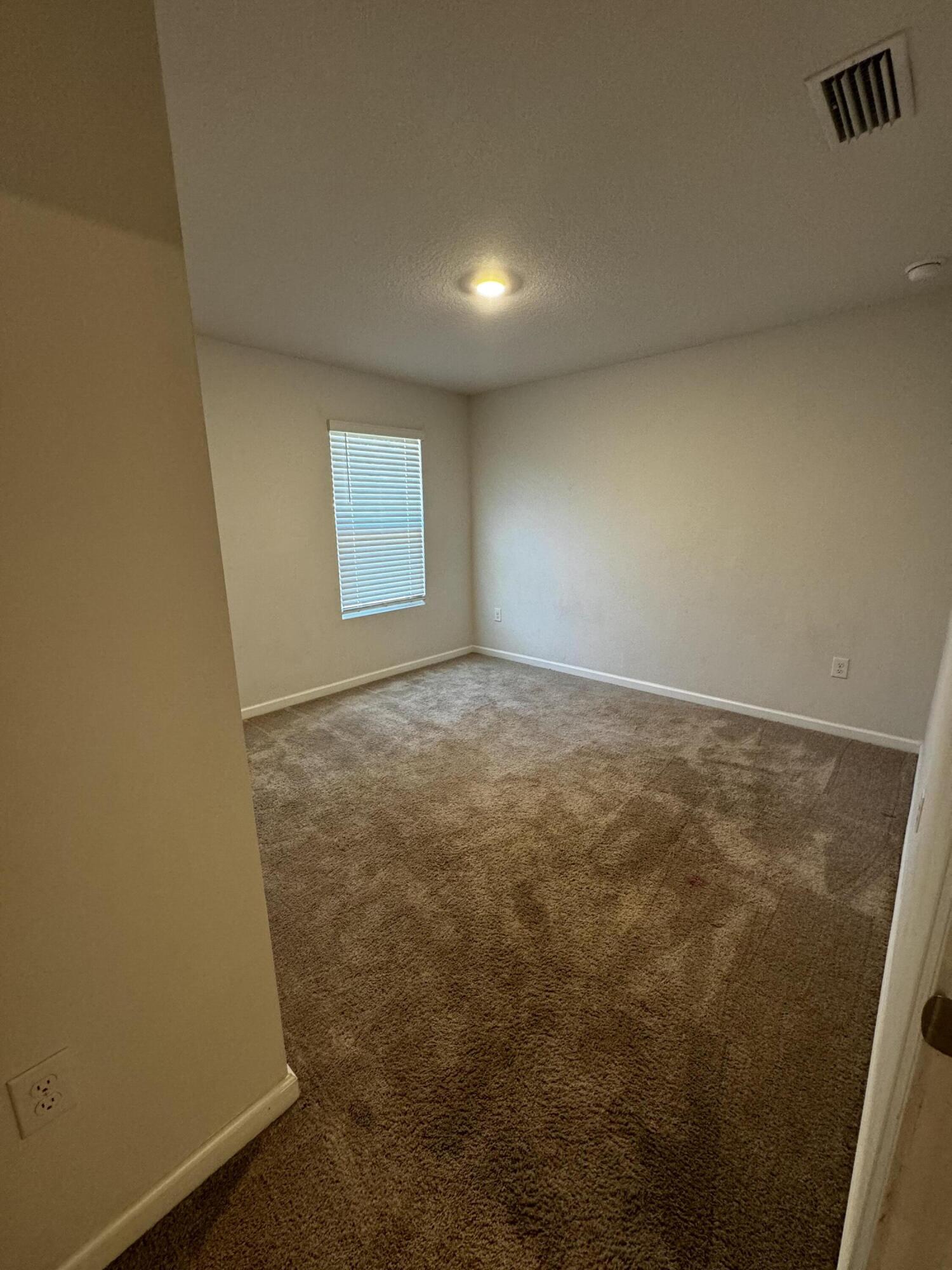 5444 Merlin Way Milton, FL 32583 - Photo 8 of 20 an empty room with windows