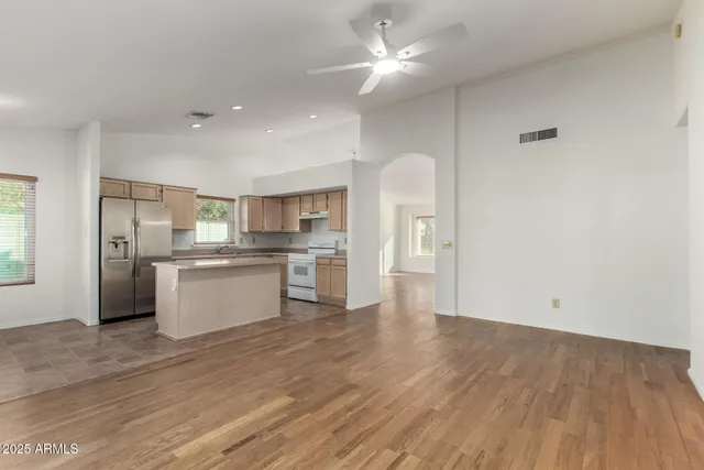 a view of kitchen with wooden floor