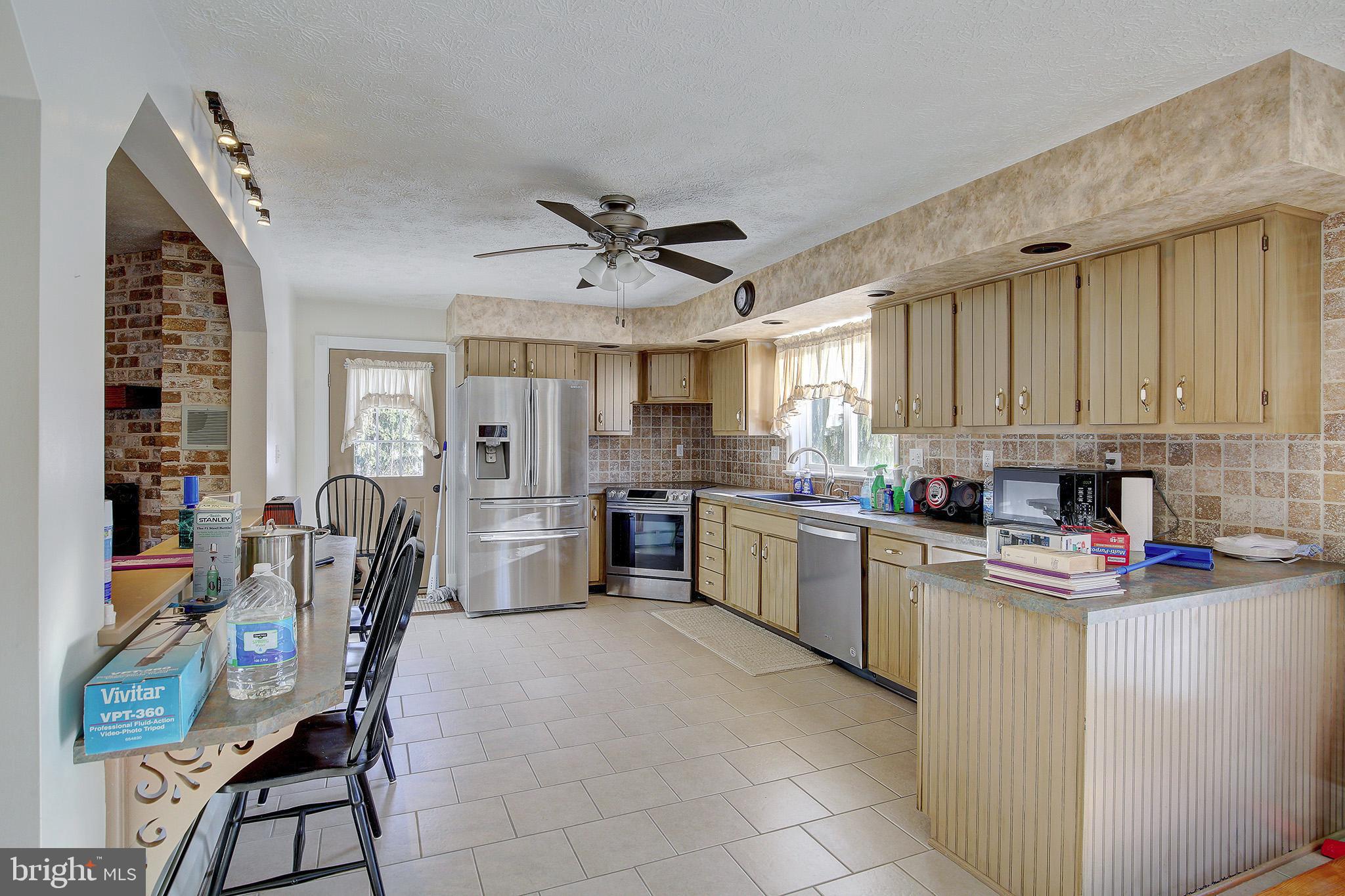 241 Earth Station Road Catawissa, PA 17820 - Photo 12 of 18 a kitchen that has a lot of cabinets in it and appliances