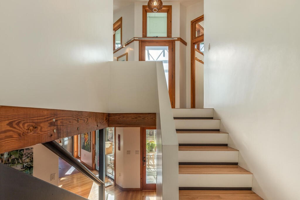 4 John-Wilson Lane Lexington, MA 02421 - Photo 3 of 39 a view of staircase with white walls and a window