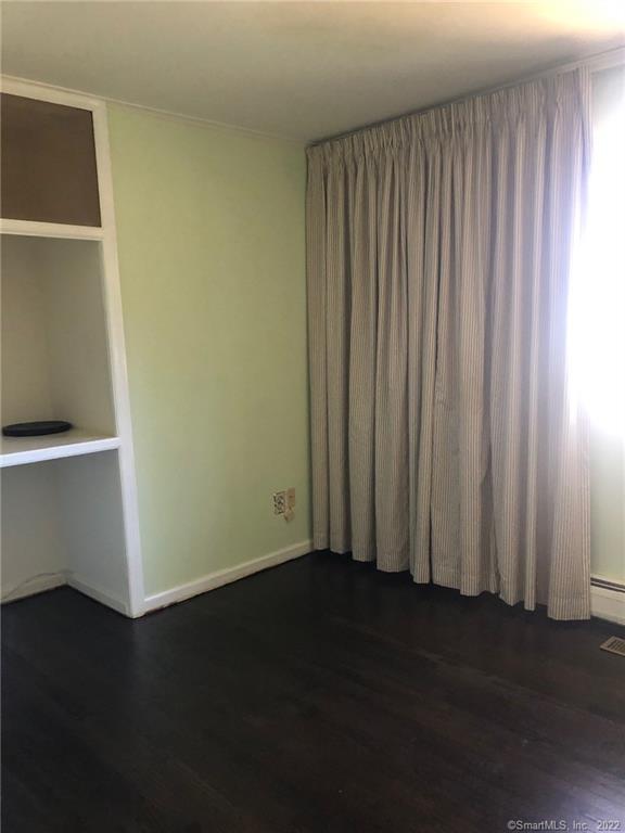 927 Burroughs Road Fairfield, CT 06825 - Photo 15 of 33 a view of a room with wooden floor