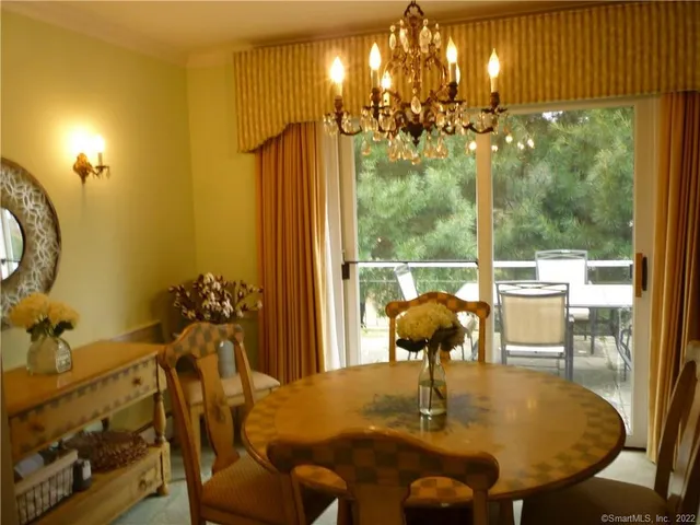 a living room with a couch and wooden floor