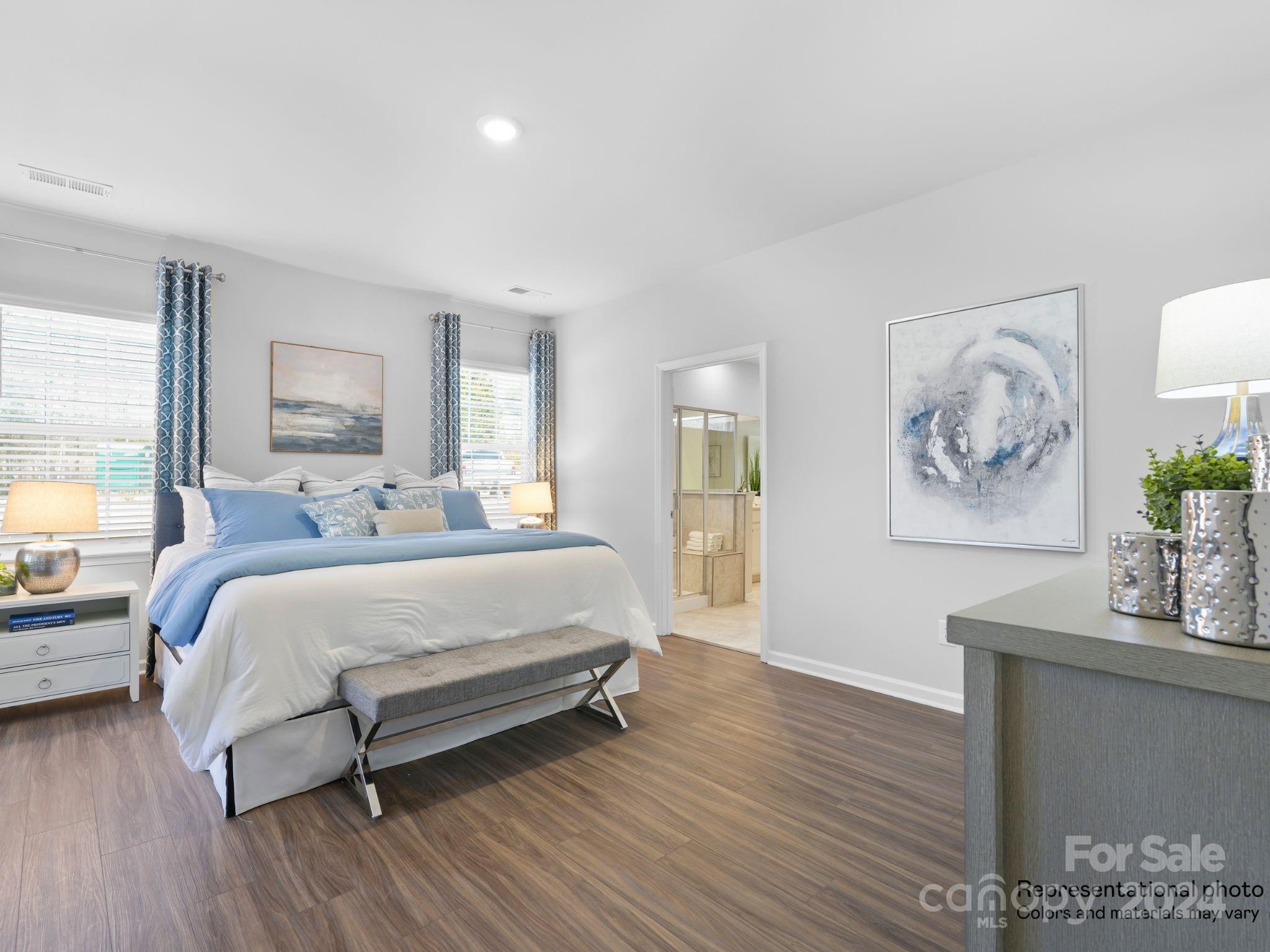 4451 Doyle Rdg Road Maiden, NC 28650 - Photo 14 of 21 a bed room with a bed and a painting on the wall